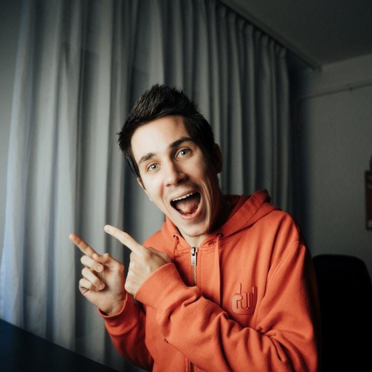 Kaveri Mehta, Lead Design Curator at Clear Plate Haven, reviewing corporate floral arrangements